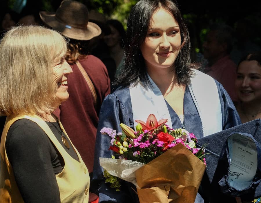 Sadie Gleasman in the park after graduation