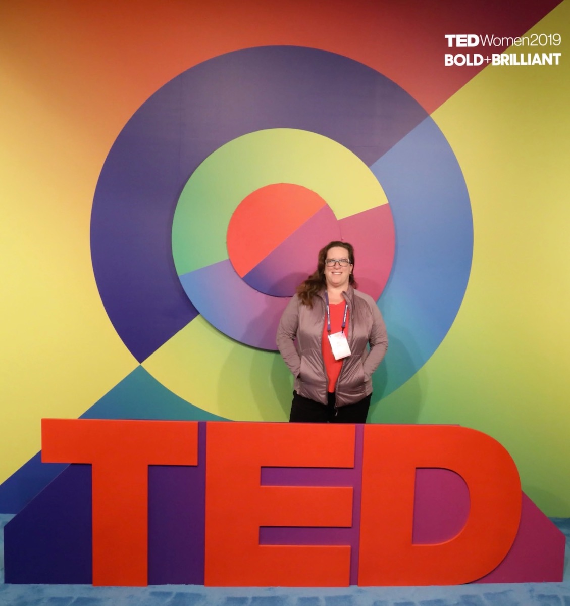 Barrie Hillman standing at the TEDWomen stage - December 2019