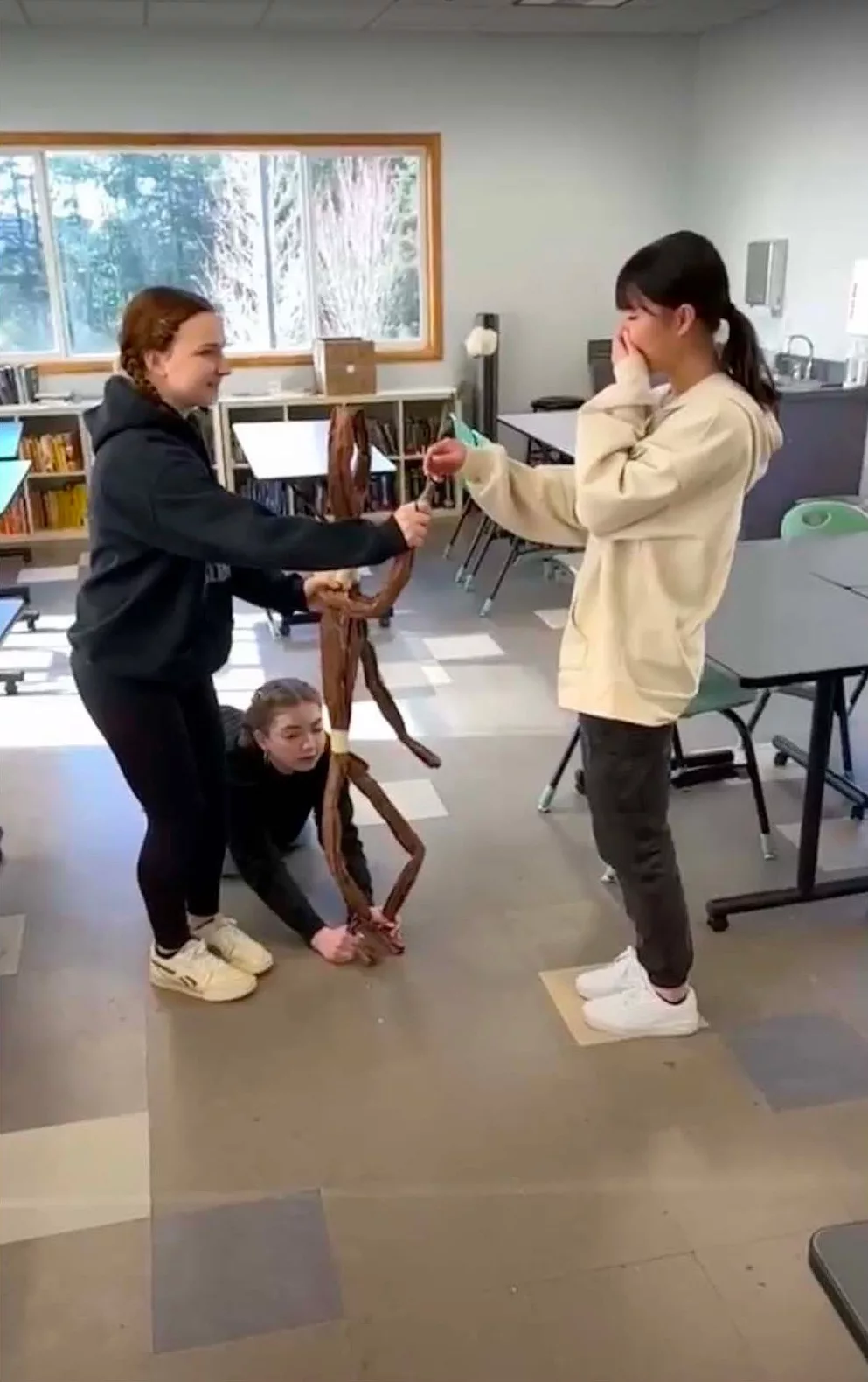 A bit of a surprise when this 10th Grade Theatre Student shakes hands with her group's puppet