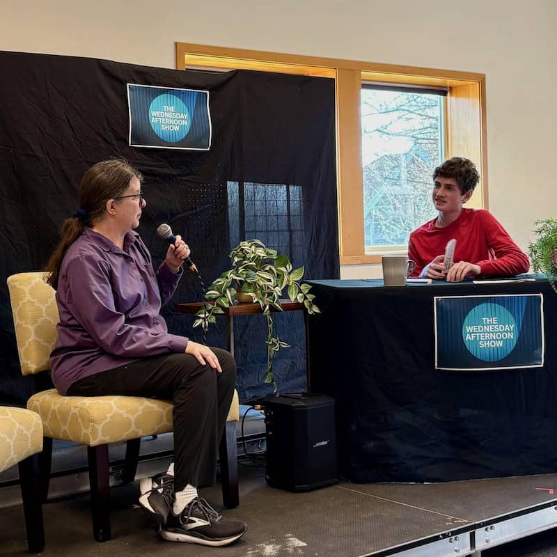 Talk show guest Bernice Cavalluzzi being interviewed by host Jackson Herboldshimer