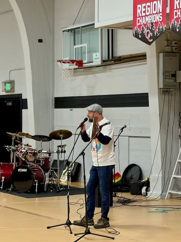 WSA Music teacher Paul Burback in the Olympic College gym for the Open Mic! workshop at the 2026 Kitsap Youth Rally WSA Music teacher Paul Burback in the Olympic College gym for the Open Mic! workshop at the 2026 Kitsap Youth Rally