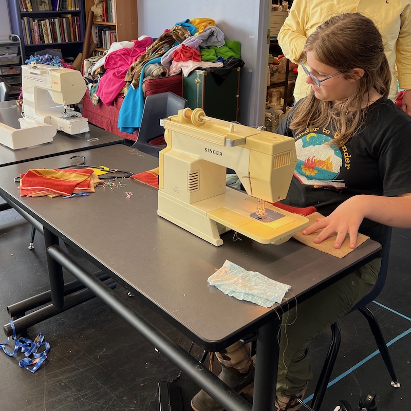 Making quilts for donation in a June Term class
