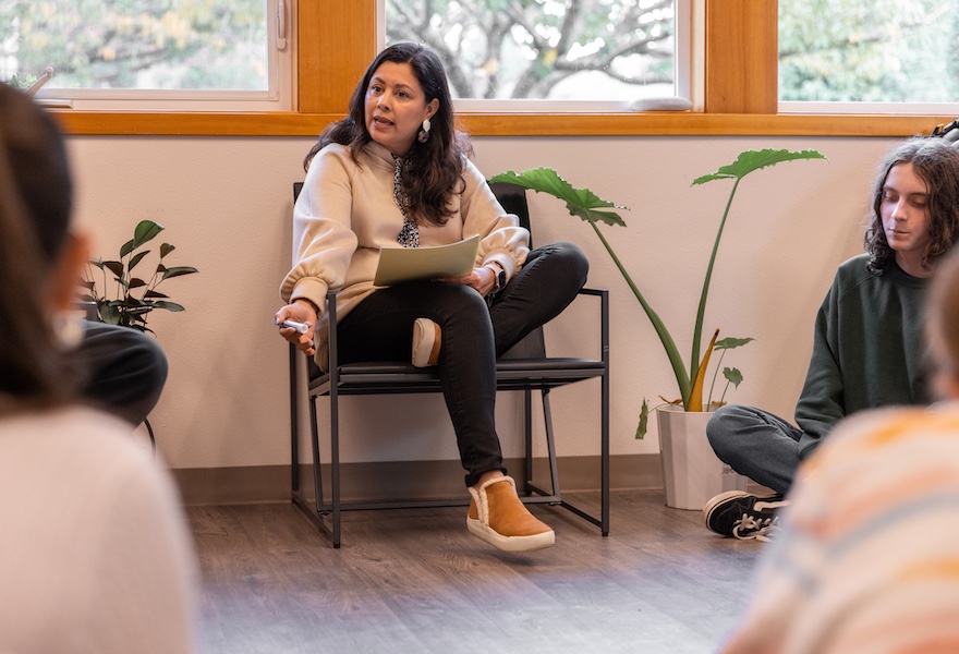 Upper School Spanish teacher talking to her students