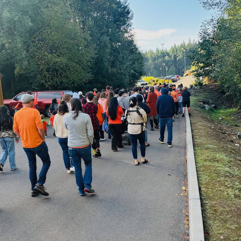 Every_Child_Matters_Sept-28-2026_Walking_to_Fitness_Center WSA students and staff walk with Chief Kitsap Academy students and tribal elders to the Fitness Center for the assembly
